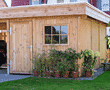 Carport-Geräteraum aus Vollholz oder Brettschichtholz